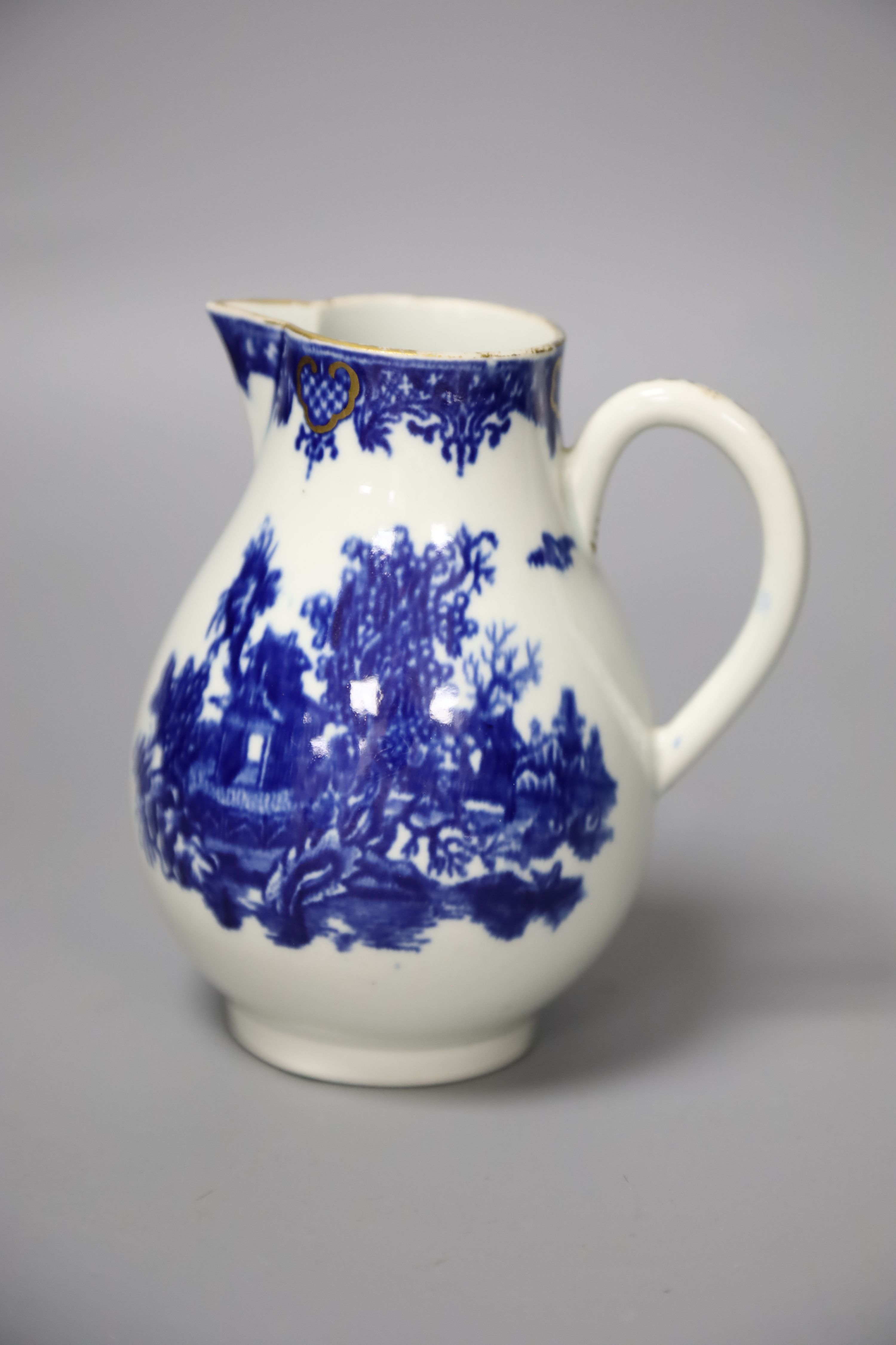 An 18th century Worcester sparrow beak jug with the Argument pattern in blue, disguised numeral mark, height 12cm